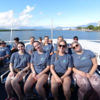 Marine conservation volunteers on boat